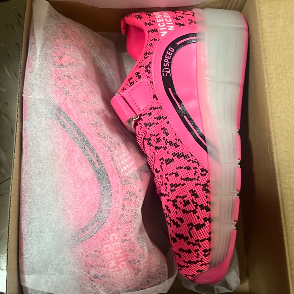 SDSpeed Kids Roller shoes (never worn)